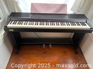 MaxSold Auction: Roland Digital Piano 800 (Model HP-800), Made in Japan – Includes Stand, Pedals & Manuals - Toronto (Ontario, Canada) SELLER MANAGED Moving Online Auction - 1/2  Wellesley Street East