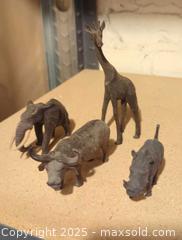 MaxSold Auction: Set of 4 Decorative Resin African Animal Figures  - Toronto (Ontario, Canada) SELLER MANAGED Moving Online Auction - 1/2  Wellesley Street East