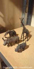 MaxSold Auction: Set of 4 Decorative Resin African Animal Figures  - Toronto (Ontario, Canada) SELLER MANAGED Moving Online Auction - 1/2  Wellesley Street East