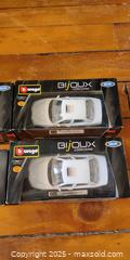 MaxSold Auction: Set of 4 Die-Cast Model Cars – Bburago & Maisto (Boxed) - Toronto (Ontario, Canada) SELLER MANAGED Moving Online Auction - 1/2  Wellesley Street East