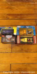 MaxSold Auction: Set of 4 Die-Cast Model Vehicles in Boxes - Toronto (Ontario, Canada) SELLER MANAGED Moving Online Auction - 1/2  Wellesley Street East