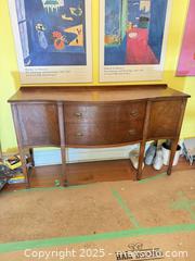 MaxSold Auction: Solid Wood Vintage Sideboard / Server with Curved Front & Brass Hardware - Toronto (Ontario, Canada) SELLER MANAGED Moving Online Auction - 1/2  Wellesley Street East