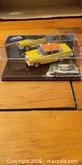 MaxSold Auction: Taxis of the World – Amsterdam Mercedes 220SE Diecast Model (Boxed)  - Toronto (Ontario, Canada) SELLER MANAGED Moving Online Auction - 1/2  Wellesley Street East