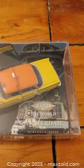 MaxSold Auction: Taxis of the World – Amsterdam Mercedes 220SE Diecast Model (Boxed)  - Toronto (Ontario, Canada) SELLER MANAGED Moving Online Auction - 1/2  Wellesley Street East