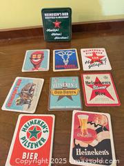 MaxSold Auction: Vintage Heineken Beer Coasters & Advertising Tin – Dutch Brewery Graphics - Toronto (Ontario, Canada) SELLER MANAGED Moving Online Auction - 1/2  Wellesley Street East