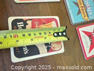 MaxSold Auction: Vintage Heineken Beer Coasters & Advertising Tin – Dutch Brewery Graphics - Toronto (Ontario, Canada) SELLER MANAGED Moving Online Auction - 1/2  Wellesley Street East
