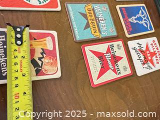 MaxSold Auction: Vintage Heineken Beer Coasters & Advertising Tin – Dutch Brewery Graphics - Toronto (Ontario, Canada) SELLER MANAGED Moving Online Auction - 1/2  Wellesley Street East