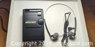 MaxSold Auction: Vintage Sony Walkman FM/AM “Mega Bass” Receiver with Headset  - Toronto (Ontario, Canada) SELLER MANAGED Moving Online Auction - 1/2  Wellesley Street East