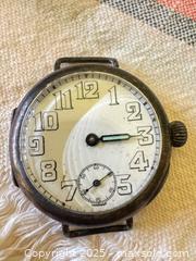 MaxSold Auction: Vintage WWI-Era Trench Watch with Hinged Case & Military Inscription – Approx. 32–33mm  - Toronto (Ontario, Canada) SELLER MANAGED Moving Online Auction - 1/2  Wellesley Street East