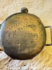 MaxSold Auction: Vintage WWI-Era Trench Watch with Hinged Case & Military Inscription – Approx. 32–33mm  - Toronto (Ontario, Canada) SELLER MANAGED Moving Online Auction - 1/2  Wellesley Street East