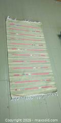 MaxSold Auction: Woven Green Area Rug with Pink & Multi-Color Accents – 2’ x 4’  - Toronto (Ontario, Canada) SELLER MANAGED Moving Online Auction - 1/2  Wellesley Street East