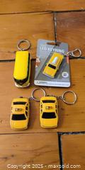 MaxSold Auction: Yellow Taxi Car Keychain Lot Including LED Keyring (4 Pieces) - Toronto (Ontario, Canada) SELLER MANAGED Moving Online Auction - 1/2  Wellesley Street East
