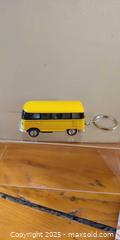 MaxSold Auction: Yellow Taxi Car Keychain Lot Including LED Keyring (4 Pieces) - Toronto (Ontario, Canada) SELLER MANAGED Moving Online Auction - 1/2  Wellesley Street East