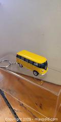 MaxSold Auction: Yellow Taxi Car Keychain Lot Including LED Keyring (4 Pieces) - Toronto (Ontario, Canada) SELLER MANAGED Moving Online Auction - 1/2  Wellesley Street East