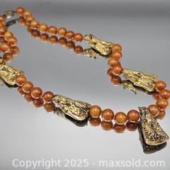 MaxSold Auction: Beaded Necklace with Four Gold-Toned Metal Pendants - Hatboro (Pennsylvania, USA) PARTNER MANAGED Estate Sale Online Auction -  Jacksonville Road