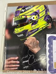 MaxSold Auction: Lewis Hamilton sign picture with coa  - Brampton (Ontario, Canada) PARTNER MANAGED Commercial Liquidation Online Auction - Rosedale Avenue West