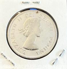 MaxSold Auction: 1964 Cdn. Silver Queen Elizabeth II 1 Dollar   - Newmarket (Ontario, Canada) PARTNER MANAGED Reseller Online Auction - Walter Avenue