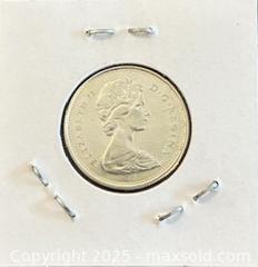 MaxSold Auction: 1967 Cdn. Silver Queen Elizabeth II 25 Cents  - Newmarket (Ontario, Canada) PARTNER MANAGED Reseller Online Auction - Walter Avenue