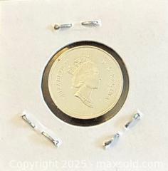 MaxSold Auction: 1998 Cdn. Silver Proof Queen Elizabeth II 5 Cents   - Newmarket (Ontario, Canada) PARTNER MANAGED Reseller Online Auction - Walter Avenue