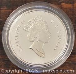 MaxSold Auction: 1999 Cdn. Silver Proof Queen Elizabeth II 50 Cents  - Newmarket (Ontario, Canada) PARTNER MANAGED Reseller Online Auction - Walter Avenue