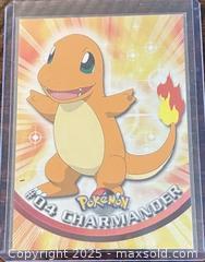 MaxSold Auction: 1999 Topps TV Charmander Pokémon Collectible Trading Card  - Newmarket (Ontario, Canada) PARTNER MANAGED Reseller Online Auction - Walter Avenue