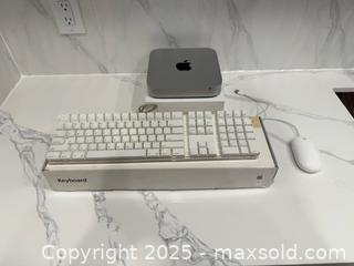 MaxSold Auction: Mac Mini Late 2012 A1347 With Keyboard & Mouse - Toronto (Ontario, Canada) SELLER MANAGED Downsizing Online Auction - Collingdale Road