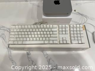 MaxSold Auction: Mac Mini Late 2012 A1347 With Keyboard & Mouse - Toronto (Ontario, Canada) SELLER MANAGED Downsizing Online Auction - Collingdale Road