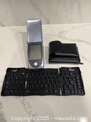 MaxSold Auction: Vintage HP Jornada 560 Pocket PC with Keyboard - Toronto (Ontario, Canada) SELLER MANAGED Downsizing Online Auction - Collingdale Road