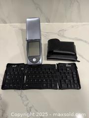 MaxSold Auction: Vintage HP Jornada 560 Pocket PC with Keyboard - Toronto (Ontario, Canada) SELLER MANAGED Downsizing Online Auction - Collingdale Road