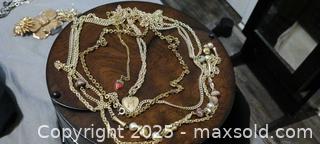 MaxSold Auction: Lot of Gold-Tone Necklaces with Pearls and Enamel Charms - Windsor (Ontario, Canada) SELLER MANAGED Moving Online Auction - Hickory Road