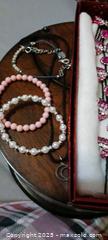 MaxSold Auction: Mixed women's jewelry lot: stretch bracelets,  hair comb, floral stud - Windsor (Ontario, Canada) SELLER MANAGED Moving Online Auction - Hickory Road