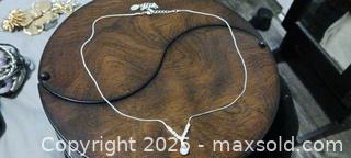 MaxSold Auction: Silver-Plated Teardrop Pendant Necklace with Estimated Diamond. Swarovski - Windsor (Ontario, Canada) SELLER MANAGED Moving Online Auction - Hickory Road