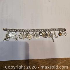 MaxSold Auction: Vintage sterling silver charm bracelet  - Caledon (Ontario, Canada) SELLER MANAGED Downsizing Online Auction - Hurontario Street