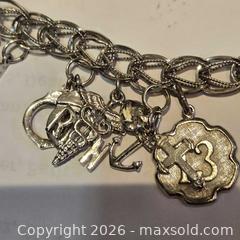 MaxSold Auction: Vintage sterling silver charm bracelet  - Caledon (Ontario, Canada) SELLER MANAGED Downsizing Online Auction - Hurontario Street