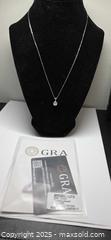 MaxSold Auction: Certified moissanite necklace  - Toronto (Ontario, Canada) PARTNER MANAGED Reseller Online Auction - Gerrard Street East