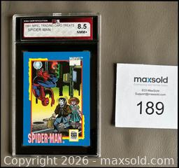 MaxSold Auction: 1991 Impel Spiderman Card Graded KSA 8.5 NEAR MINT-MINT+  - Ottawa (Ontario, Canada) SELLER MANAGED Downsizing Online Auction - Sandy Forest Place