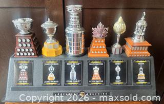 MaxSold Auction: 2003 McDonald's Greatest NHL Trophies Set on Custom Stand  - Ottawa (Ontario, Canada) SELLER MANAGED Downsizing Online Auction - Sandy Forest Place