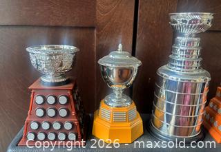 MaxSold Auction: 2003 McDonald's Greatest NHL Trophies Set on Custom Stand  - Ottawa (Ontario, Canada) SELLER MANAGED Downsizing Online Auction - Sandy Forest Place