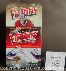 MaxSold Auction: Factory Sealed 2009-10 Upper Deck Victory Hockey Card Tin Box w / 16 Packs   - Ottawa (Ontario, Canada) SELLER MANAGED Downsizing Online Auction - Sandy Forest Place