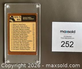 MaxSold Auction:  1975-76 OPC Bobby Orr Scoring Leaders Card - Ottawa (Ontario, Canada) SELLER MANAGED Downsizing Online Auction - Sandy Forest Place