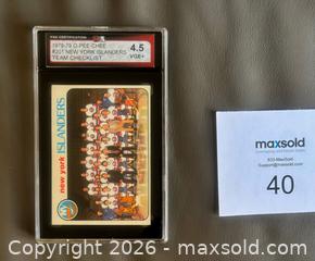 MaxSold Auction: 1978-79 OPC New York Islanders Team Checklist Card Graded KSA 4.5 VGE+ - Ottawa (Ontario, Canada) SELLER MANAGED Downsizing Online Auction - Sandy Forest Place