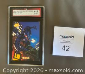 MaxSold Auction: 1992 Marvel Masterpieces Venom Card Graded KSA 6.5 E-NM+ - Ottawa (Ontario, Canada) SELLER MANAGED Downsizing Online Auction - Sandy Forest Place