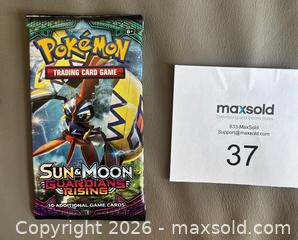 MaxSold Auction: 2017 Pokémon "Sun & Moon Guardians Rising"   Booster Pack of Cards Factory Sealed - Ottawa (Ontario, Canada) SELLER MANAGED Downsizing Online Auction - Sandy Forest Place