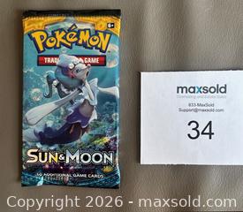 MaxSold Auction: Lot # 1 - 2017 Pokémon "Sun & Moon" Booster Pack of Cards Factory Sealed  - Ottawa (Ontario, Canada) SELLER MANAGED Downsizing Online Auction - Sandy Forest Place
