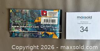 MaxSold Auction: Lot # 1 - 2017 Pokémon "Sun & Moon" Booster Pack of Cards Factory Sealed  - Ottawa (Ontario, Canada) SELLER MANAGED Downsizing Online Auction - Sandy Forest Place