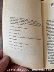 MaxSold Auction: Lot of 3 Paperback Books w / # 1 Superman  - Ottawa (Ontario, Canada) SELLER MANAGED Downsizing Online Auction - Sandy Forest Place