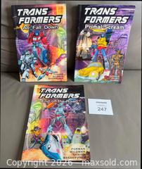 MaxSold Auction: Lot of 3  x Transformers Graphic Comic Softcover Books - Ottawa (Ontario, Canada) SELLER MANAGED Downsizing Online Auction - Sandy Forest Place