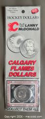 MaxSold Auction: Lot of 5 Sealed 1983-84 Calgary Flames Dollars w / Lanny McDonald - Ottawa (Ontario, Canada) SELLER MANAGED Downsizing Online Auction - Sandy Forest Place