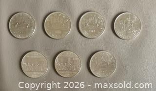 MaxSold Auction:  Lot of 7 x Canadian $1 Coins  - Ottawa (Ontario, Canada) SELLER MANAGED Downsizing Online Auction - Sandy Forest Place