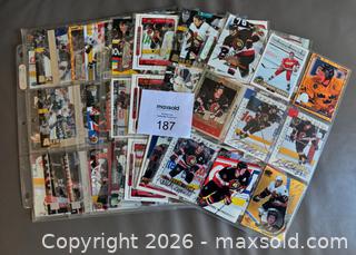 MaxSold Auction: Lot of 90 Ottawa Senators Cards in Binder Pages w / Signed Cards  - Ottawa (Ontario, Canada) SELLER MANAGED Downsizing Online Auction - Sandy Forest Place
